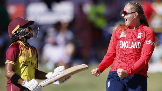 England's Sophie Ecclestone celebrates taking a wicket against West Indies successful  the Women's T20 World Cup