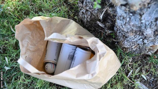 Callum Shinkwin's ball in a bag of canned water