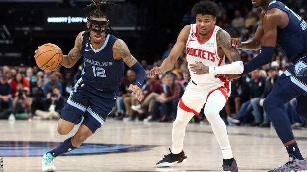 Memphis Grizzlies guard Ja Morant (left) in action against Houston Rockets