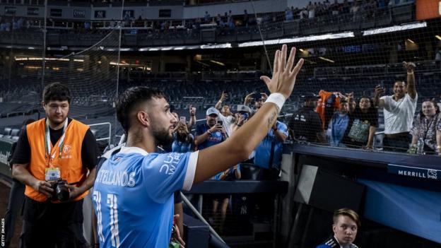 Taty Castellanos waves to New York City's fans