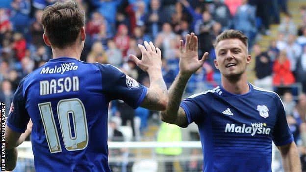 Joe Mason and Anthony Pilkington celebrate Cardiff's in over Huddersfield