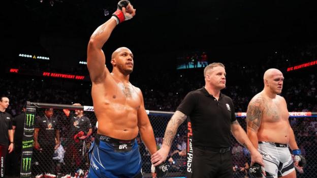 Ciryl Gane celebrates beating Serghei Spivac at UFC Paris