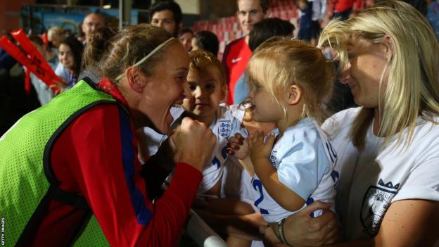 Casey Stoney celebrates with her family and twin children after the UEFA Women's Euro 2017 match between England and France