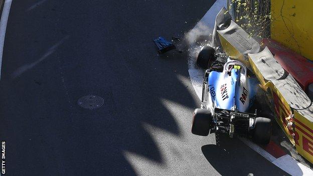 A Williams car crashes
