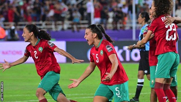 Moroccan players celebrate victory over Nigeria at the Women's Africa Cup of Nations