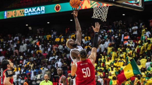 Adama Diakhite of Dakar Universite Club drives to the basket during the BAL game against AS Sale
