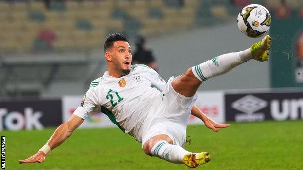 Ramy Bensebaini in action for Algeria
