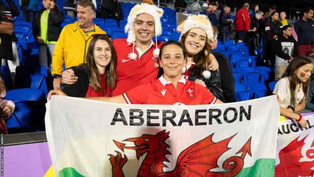 Sioned Harries with an Aberaeron flag