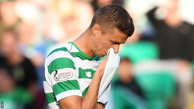 Jozo Simunovic holds his head down after being sent off against Alashkert