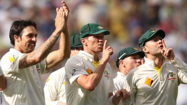 Mitchell Johnson, Peter Seidel and Michael Clarke gesture to England fans in the 2013 Melbourne Test