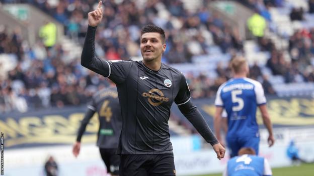 Joel Piroe celebrates
