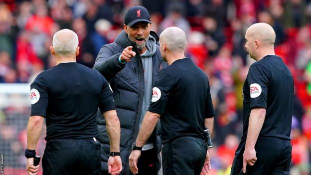 Liverpool manager Jurgen Klopp speaks to the match officials at the end of Sunday's win over Tottenham