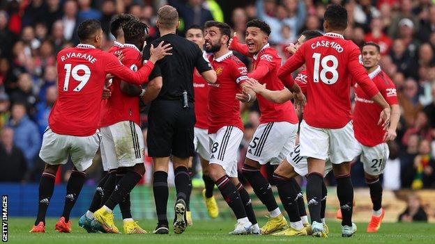 Virtually the entire outfield Manchester United line-up protested the decision to referee Craig Pawson.