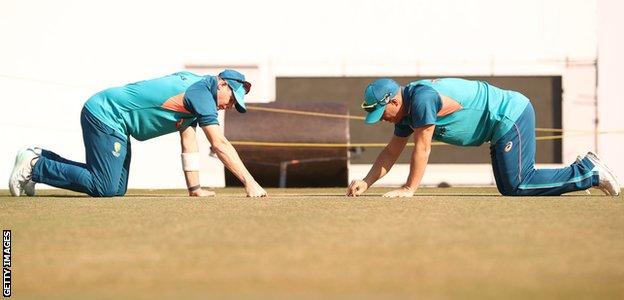 Steve Smith, left, and David Warner look at the pitch for the first Test, which begins in Nagpur on Thursday (04:00 GMT)