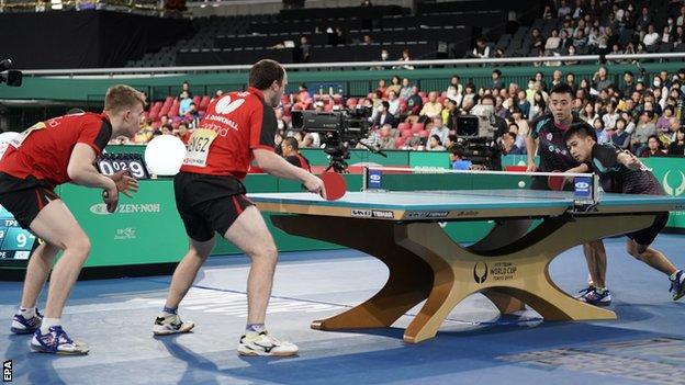 England's Tom Jarvis (left) and Paul Drinkhall in action against and Chinese Taipei's Chen Chien-An and Liao Cheng-Ting