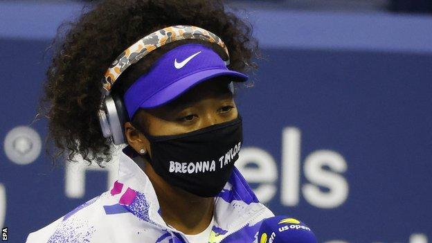 Naomi Osaka walked out on court wearing a face mask with the name of Breonna Taylor, a black woman who was shot dead by a policeman in March in the United States