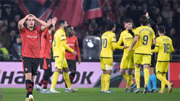 Rennes players are dejected after having a late equaliser ruled out