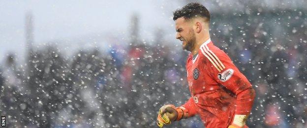 Ayr goalkeeper Jack Ruddy in the snow