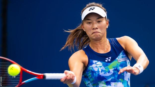 Lily Miyazaki returns a ball against Belinda Bencic at the US Open