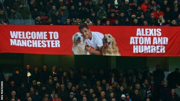 The United fans showed their appreciation for their new number seven...and his dogs