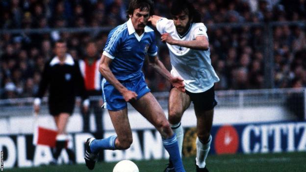 Manchester City's Tommy Hutchison takes on Tottenham's Ricky Villa in the 1981 FA Cup final, which Spurs won in a replay