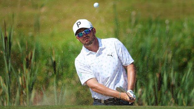 Ewen Ferguson plays a bunker shot at Galgorm Castle on Saturday