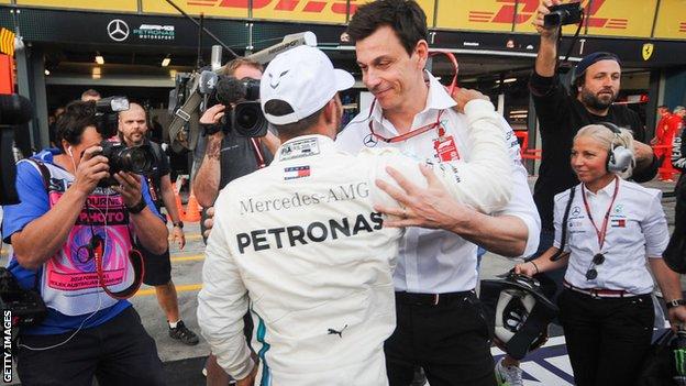 Mercedes boss Toto Wolff congratulates driver Lewis Hamilton