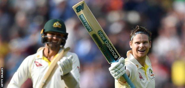 Steve Smith celebrates a century