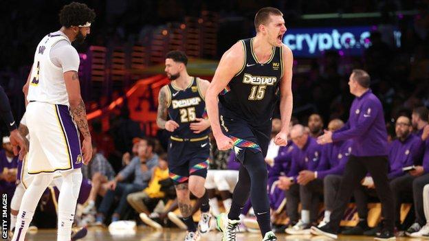 Nikola Jokic celebrates