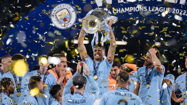 Rodri lifts Champions League trophy