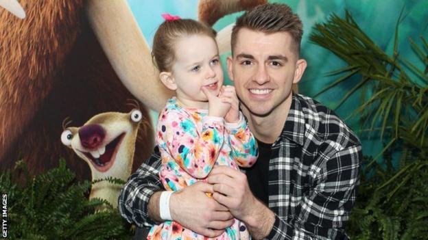 Max Whitlock with his daughter Willow