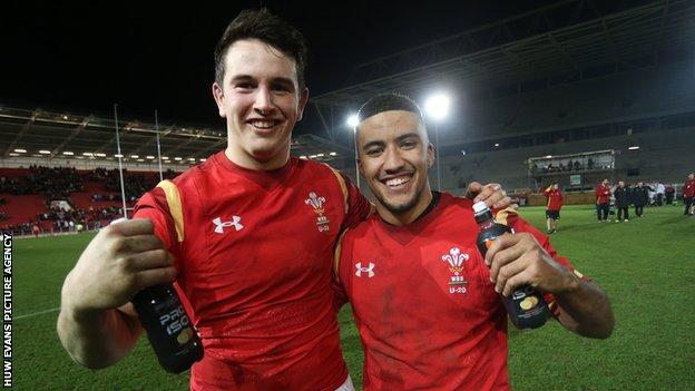 Owen Watkin and Keelan Giles of Wales Under-20 celebrate after beating England on the way to the junior Grand Slam