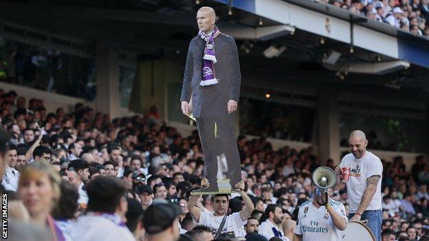 Real Madrid fan holds aloft Zidane cut-out
