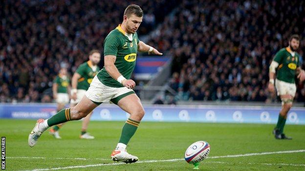 Handre Pollard kicks a penalty for South Africa against England in November 2021