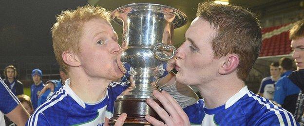 Coilin Devlin and his brother Aaron celebrate winning the 2013 Ulster club title with Ballinderry