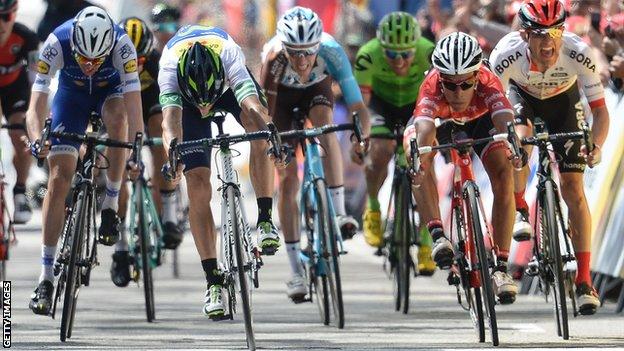 Alejandro Valverde (second left) crosses the line on Sunday