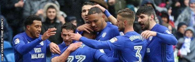 Joe Bennett celebrates Cardiff's opening goal against Burton with Kenneth Zohore and other Cardiff players
