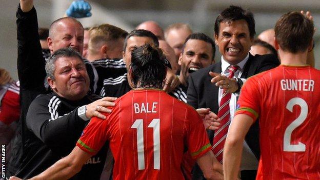 Gareth Bale and the Wales coaches celebrate