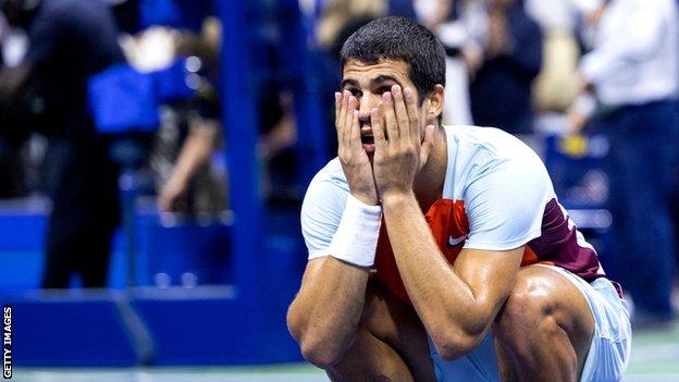 Carlos Alcaraz celebrates after defeating Jannik Sinner in the quarterfinals of the US Open