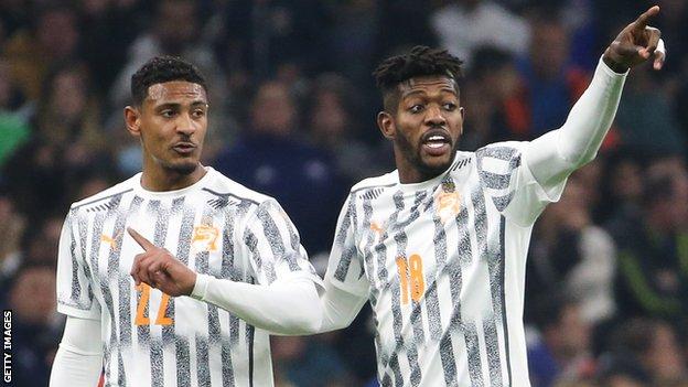 Sebastien Haller and Ibrahim Sangare in action for Ivory Coast