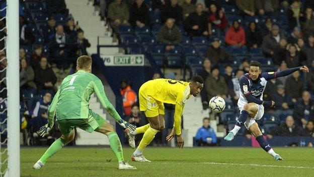 Callum Robinson of West Bromwich Albion has a shot saved by Marek Rodak of Fulham