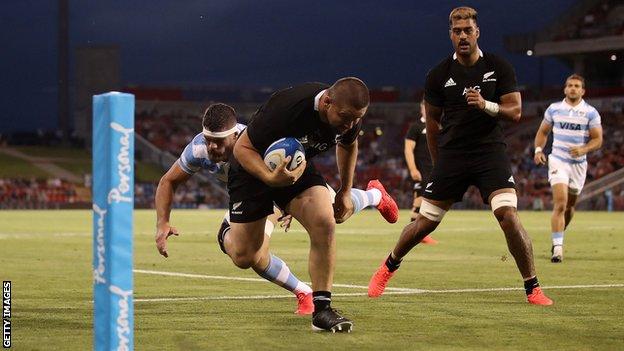 Dane Coles scores a try in the first half for New Zealand