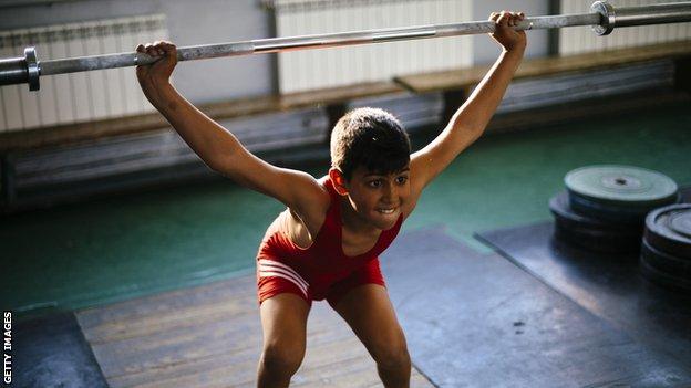 Child lifting weights in Bulgaria