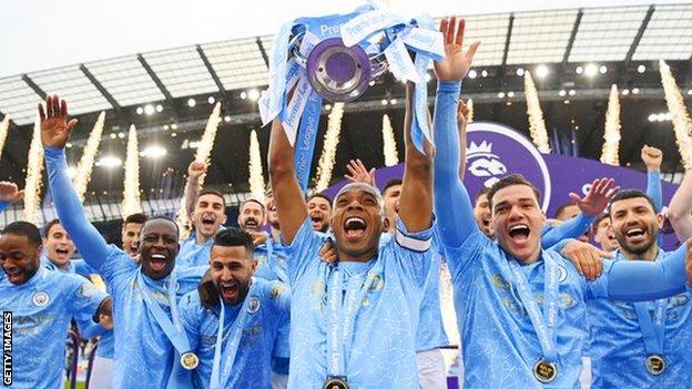 Man City lifting the Premier League trophy