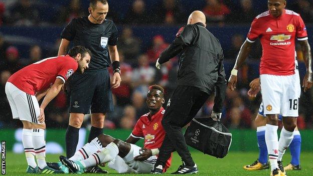 Paul Pogba receives treatment