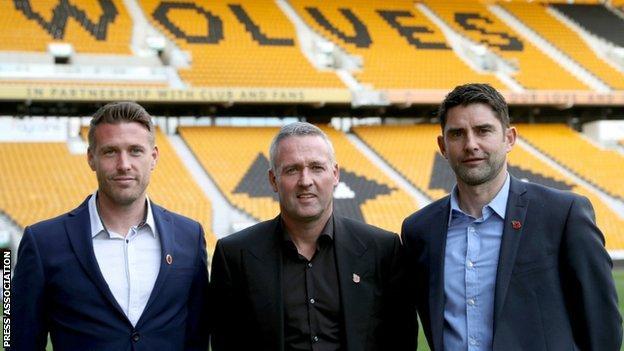 Paul Lambert and Wolves' new backroom team of Rob Edwards (left) and Stuart Taylor