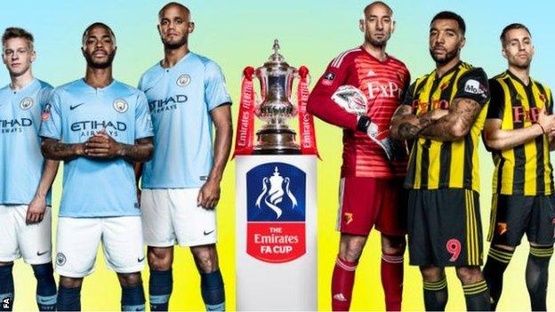 Players from Manchester City and Watford line up with the FA Cup trophy
