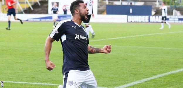 Dundee striker Kane Hemmings celebrates