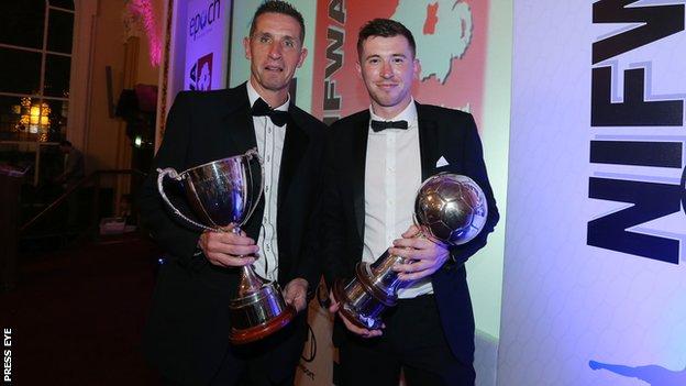 Crusaders boss Stephen Baxter and Billy Joe Burns with their awards at Belfast City Hall