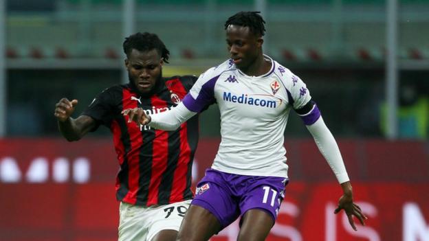 AC Milan's Franck Kessie (left) comes up against Ivory Coast compatriot Christian Kouame in a match against Fiorentina